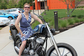 A woman on motorcycle